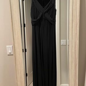 Long black cotton dress.